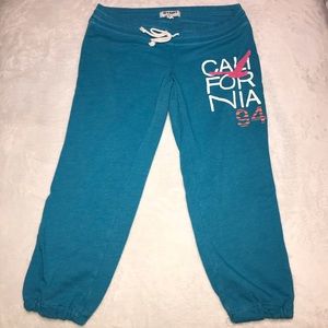 Old Navy Teal Track Pants with White & Pink Graphic